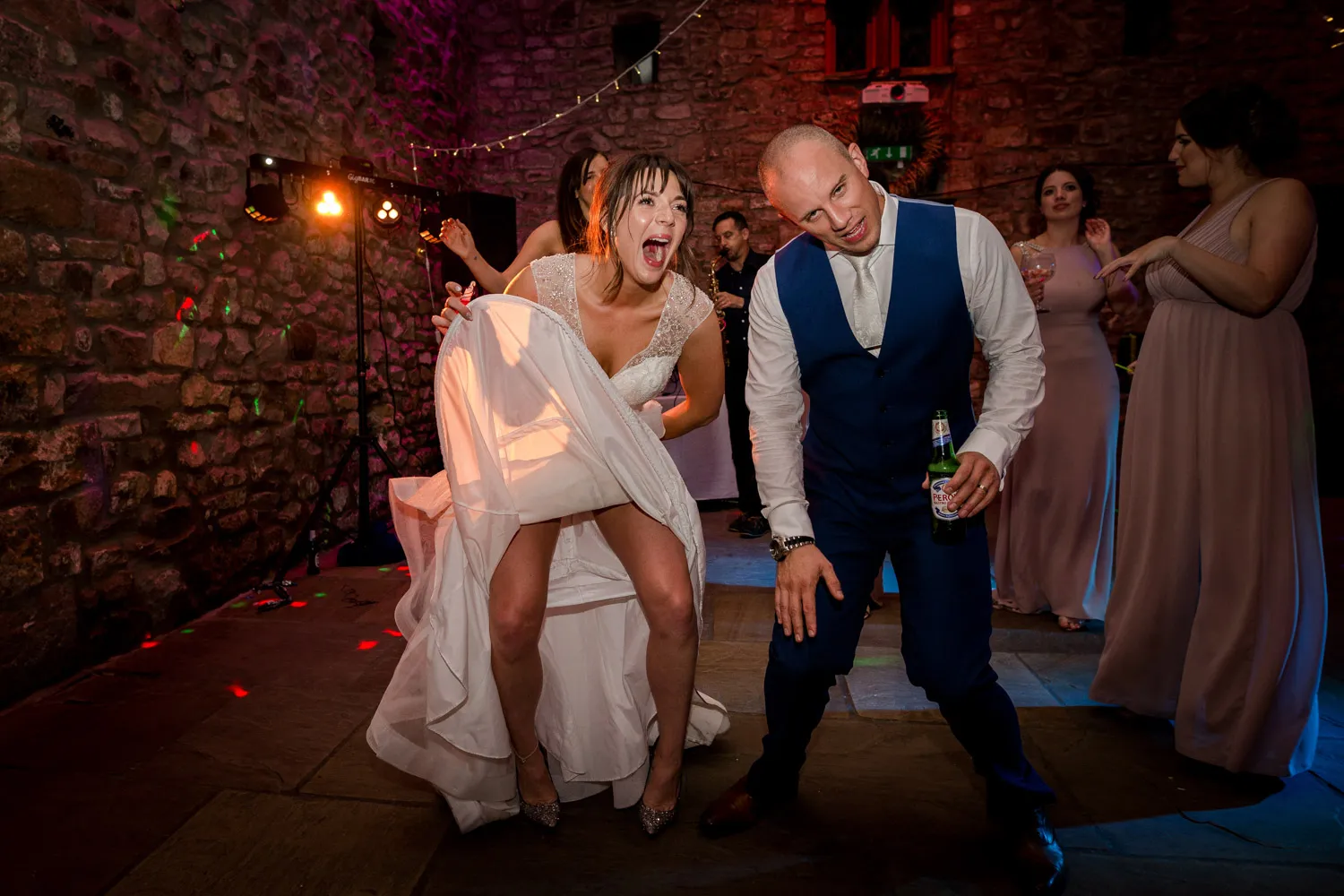 The bride and groom show off their unique dance moves