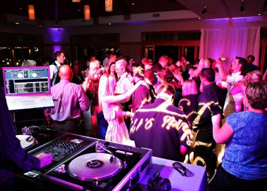 Wedding guests celebrating on the dance floor